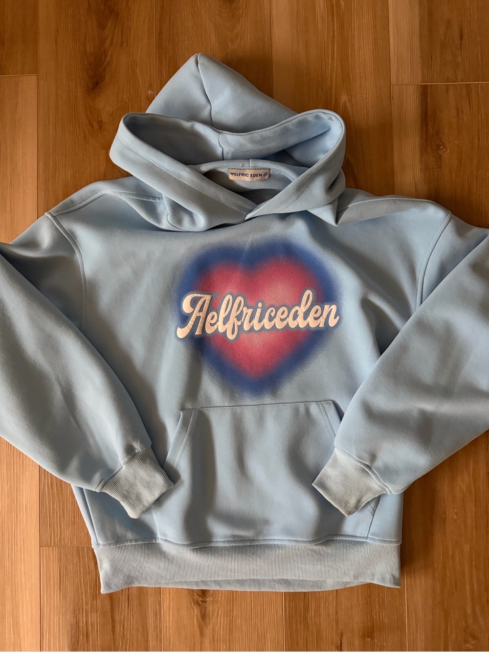 Aelfric Eden hoodie, like new! Blue w heart motif. Size XS